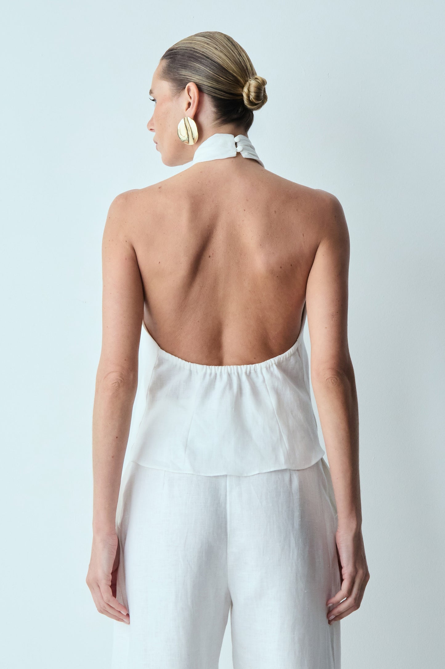 BLUSA FRENTE UNICA COM FRENTE TORCIDA HALTER COLEÇÃO VERÃO 26