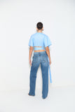 CALÇA RETA JEANS COM COSTURA DIAGONAL NA BARRA COLEÇÃO VERÃO 25